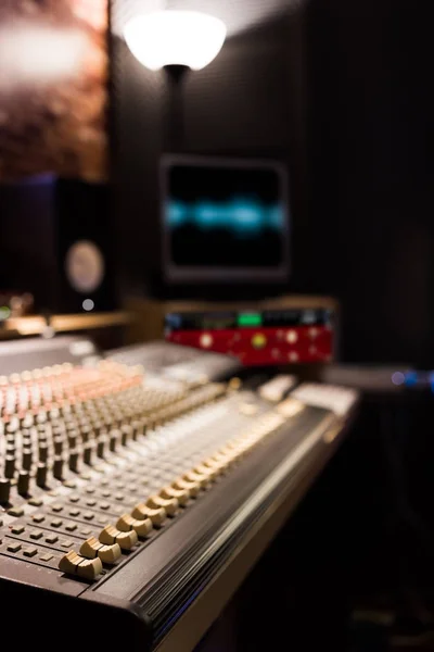 audio mixing console and studio equipment in recording, broadcasting, editing studio