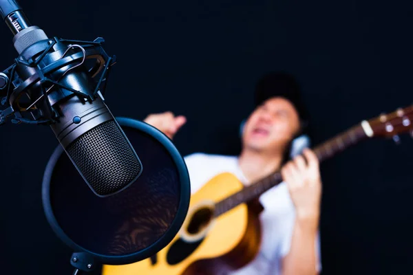 Asian Male Musician Playing Acoustic Guitar Recording Studio Focus Microphone — Stock Photo, Image