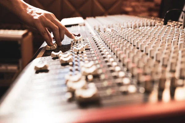 Male Professional Sound Engineer Hand Adjusting Audio Level Mixing Console — Stock Photo, Image