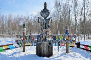 The Tazheranskaya steppe. Serge - a ritual pillar of Buryats clipart