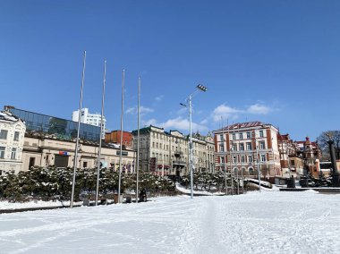 Winter view of Svetlanskaya street from the square of Fighters for the power of the Soviets. Russia, Vladivostok clipart