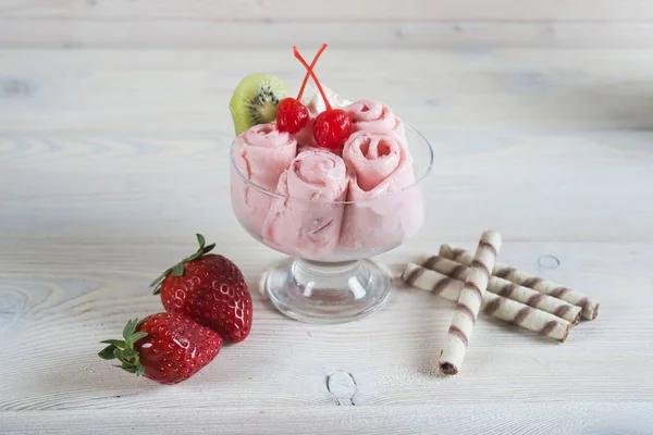 Roll of  Strawberry ice cream. Fresh fried berry ice cream, ice