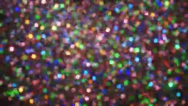 Defocus Glitter Φόντο Πολύχρωμα Πτώση Κομφετί Εκρήξεις Κομφετί Μαύρο Φόντο — Αρχείο Βίντεο