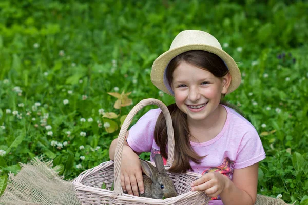 Cute Little Girl Holding Basket Rabbit — Stock Photo, Image