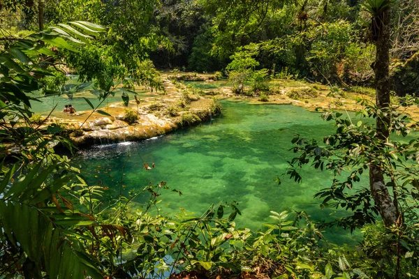 Panorama of the limestone ridge with cascades and waterfalls of 