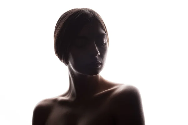 Silhouet van mooie jonge vrouw — Stockfoto