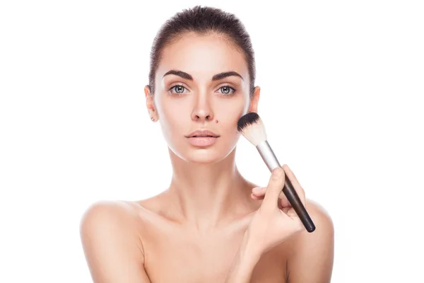 Closeup portrait of young adult woman with brush for makeup — Stock Photo, Image