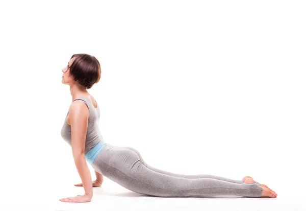 Jonge mooie vrouw yoga poseren. geïsoleerd — Stockfoto