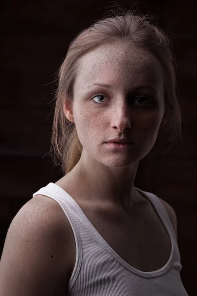 Closeup studio portrait of freckled woman without makeup — Stock Photo, Image