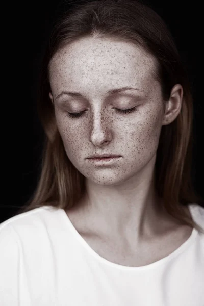 Closeup studio portrait of freckled woman without makeup — Stock Photo, Image
