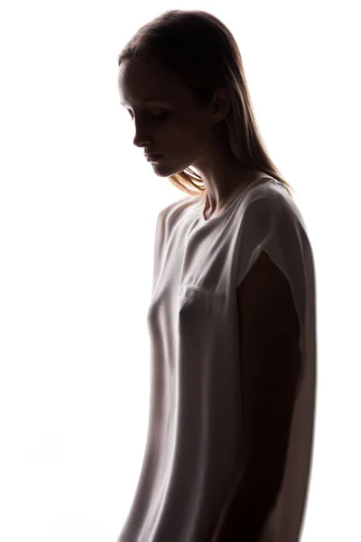 Silhouette of beautiful young woman — Stock Photo, Image