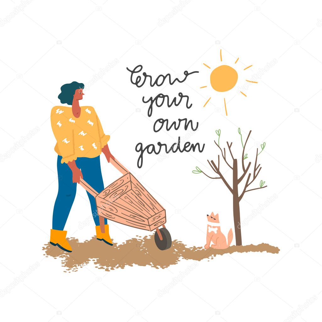 Woman in gum boots with wheelbarrow and little dog in garden
