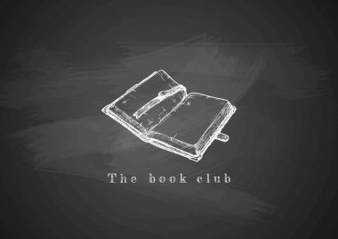 Yazı tahtası üzerinde açılan eski kitap.