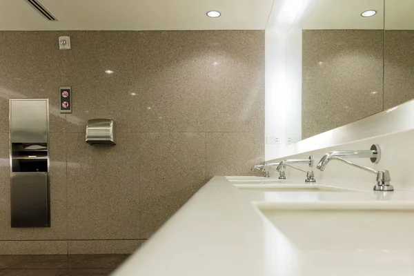 Public bathroom interior with sink — Stock Photo, Image