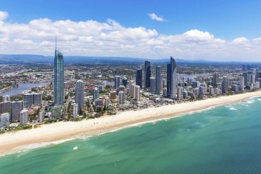 Sunny aerial view of Surfers Paradise looking inland on the Gold Coast, Queensland, Australia clipart