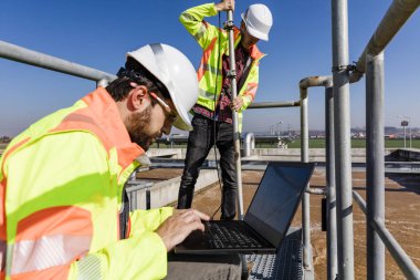 Engineers working on water treatment plant