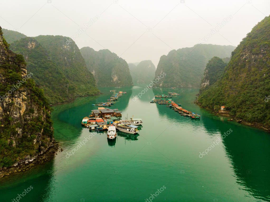 The traditional Cua Van Floating Village in Halong Bay