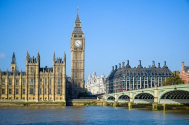 The Palace of Westminster with Big Ben clock tower and Westminster Bridge, London, England clipart