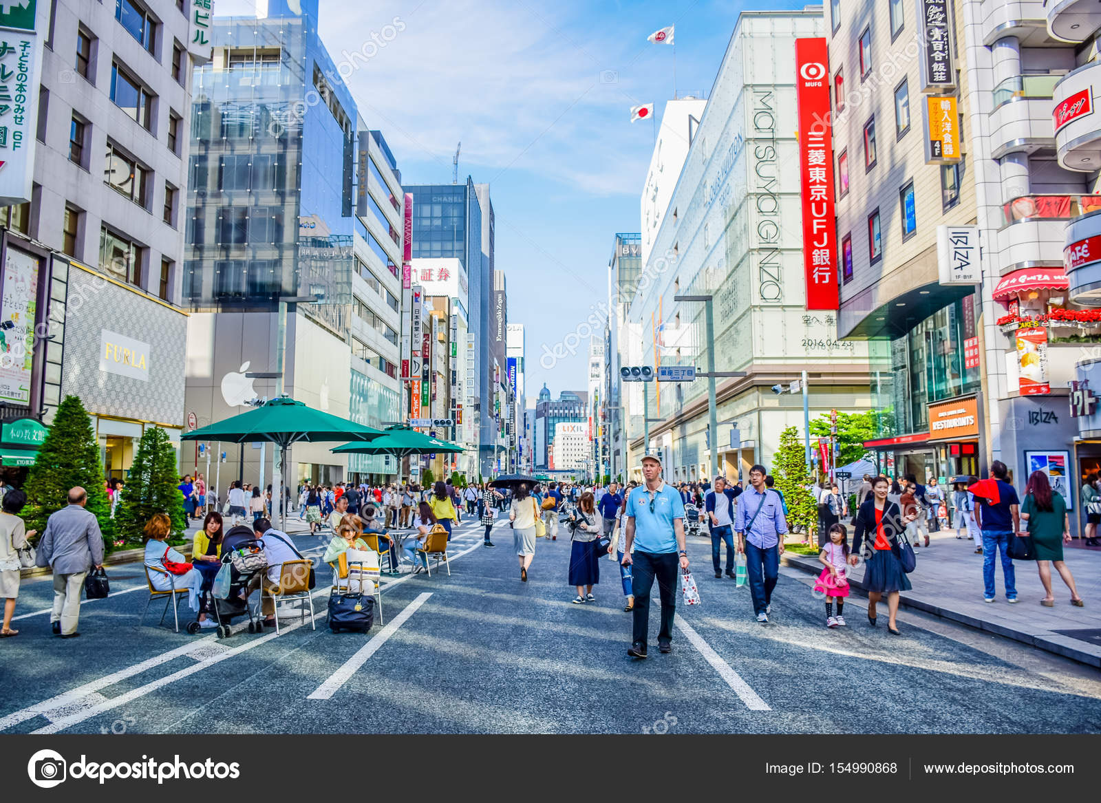 Tokyo Japan People Spending Their Time Visiting Ginza Street A Very Popular Shopping Area Of Tokyo During Weekend Stock Editorial Photo C Parrysuwanitch