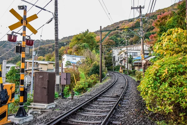 Urban train track (railway) cross the city of Hakone in Japan