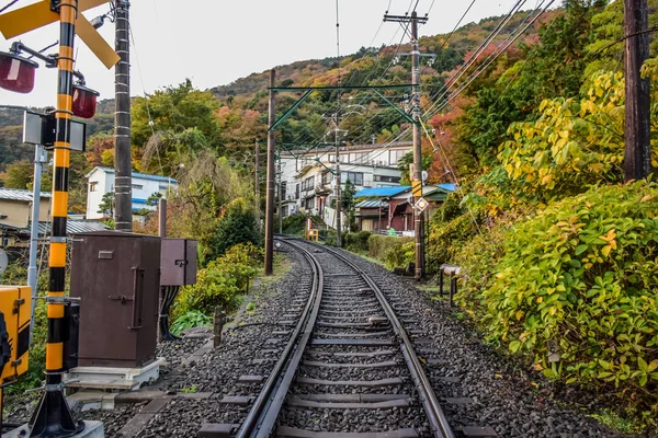 Urban train track (railway) cross the city of Hakone in Japan