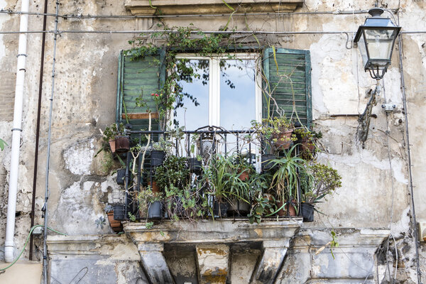 Old balcony of a house in the historic center of Palermo, Sicily, Italy, Europe