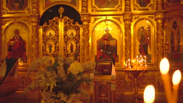 Candle in the church. — Stock Video