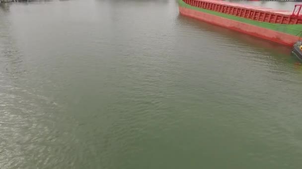 Aerial view of big grain elevators on the sea. Loading of grain on a ship. Port. Cargo ship — Stock Video