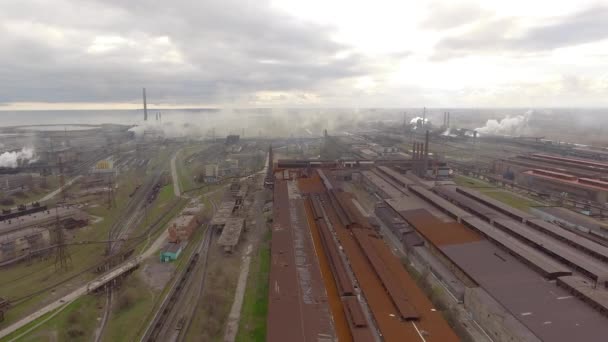 Aerial view of industrial steel plant. Aerial sleel factory. Flying over smoke steel plant pipes. Environmental pollution. Smoke. — Stock Video