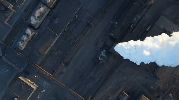 Emission to atmosphere from industrial pipes. Smokestack pipes shooted with drone. Aerial view, close-up. — Stock Video