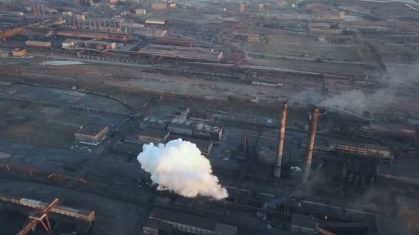 Emission to atmosphere from industrial pipes. Smokestack pipes shooted with drone. Aerial view, close-up. — Stock Video