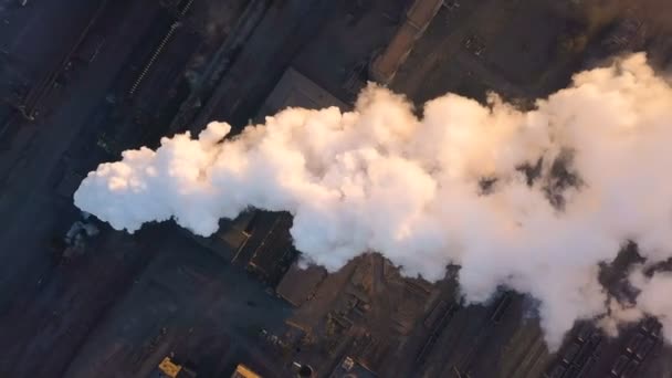 Emission to atmosphere from industrial pipes. Smokestack pipes shooted with drone. Aerial view, close-up. — Stock Video