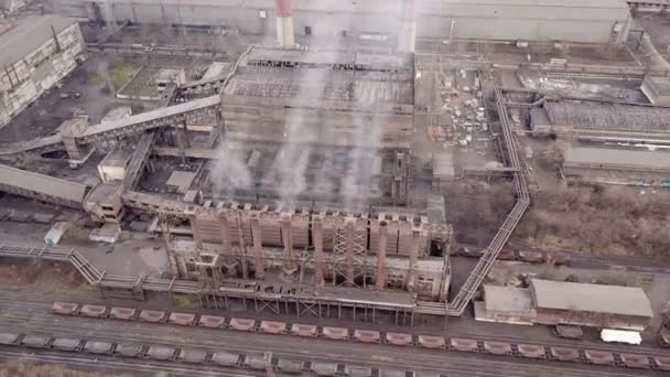 Aerial view. Emission to atmosphere from industrial pipes. Smokestack pipes shooted with drone. Close-up. — Stock Video