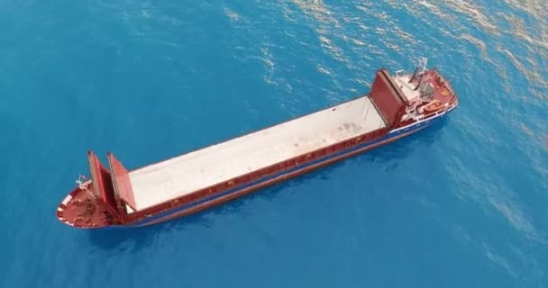 Freight ship floating on sea. Aerial view. — 비디오