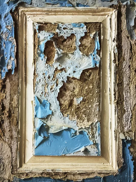 Пилинг стены краски в рамке — стоковое фото