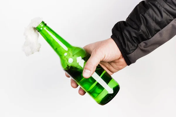 Glass bottle, the so-called Molotov cocktail in the hand of the — Stock Photo, Image