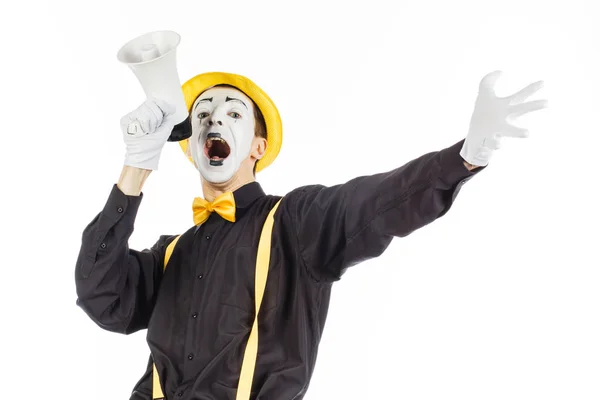 Portrait of a male mime artist, shouting or showing on a megapho — Stock Photo, Image