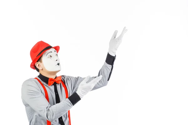 Porträtt av en man, konstnär, clown, Mime. Visar något, isolerade — Stockfoto