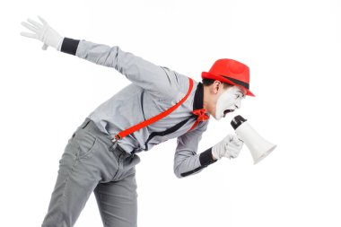 Palyaço, MIME, bir megafon tutarak. Duyguları ifade. 