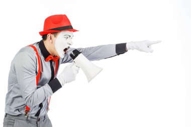 Palyaço, MIME, bir megafon tutarak. Duyguları ifade. 
