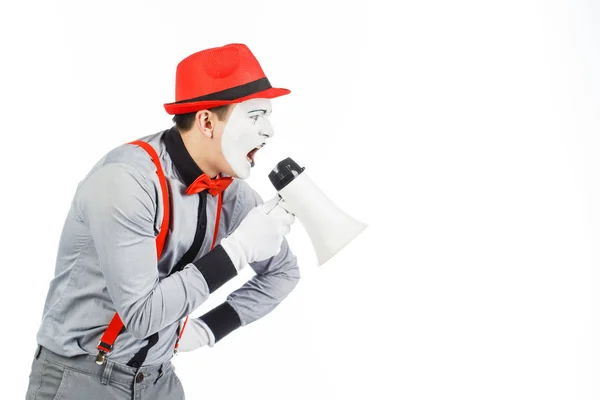 Palhaço, MIME, segurando um Megafone. A expressão das emoções . — Fotografia de Stock