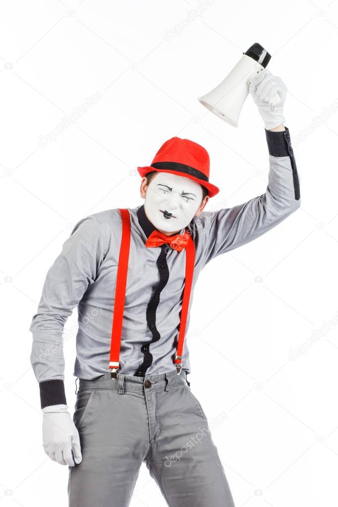 Clown, MIME, holding a Megaphone. The expression of emotions. 