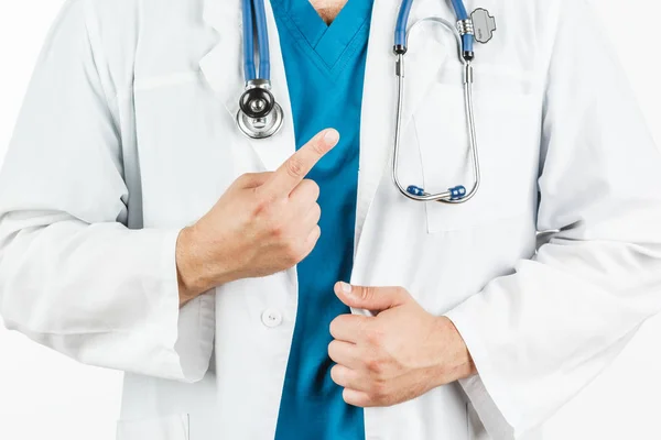 Ο γιατρός σε ένα άσπρο παλτό επιχρίσματα αριθμός ένα του χέρι. — Φωτογραφία Αρχείου