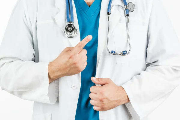 El doctor con una bata blanca mancha su mano número uno . — Foto de Stock