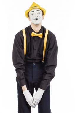 Mutlu bir genç adam, bir aktör, pandomim, başarı sevinir. 