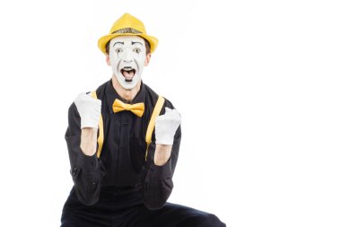 Mutlu bir genç adam, bir aktör, pandomim, başarı sevinir. 