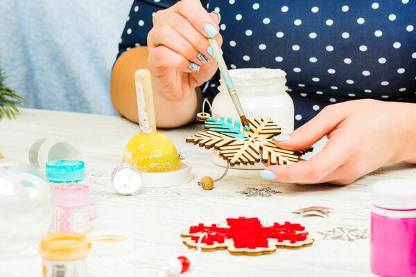 Christmas decorations, balls, toys and gift boxes on an old wood