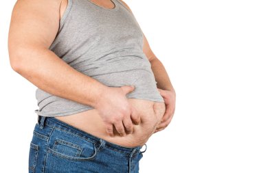 Fazla kilo olan kişi. Beyaz arka plan üzerinde izole.