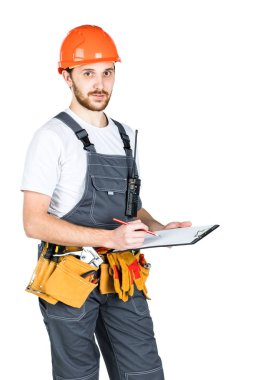 Builder panoya yazar. Beyaz adam izole