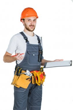 Builder panoya yazar. Beyaz adam izole